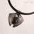 wisior-z runami-i-turmalinem-meski-wisiorek-z-miedzi-czarny-turmalin-znaki-runiczne-runy-amulet-rustykalny-na-rzemieniu