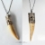 zeby-wilka-wisior-z-zeba-oprawiony-w-srebro-amulet-meska-bizuteria-poganska