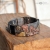 spacer-po-lace-manela-bransoletka-z-miedzi-mosiadzu-skorzane-rzemienie-widok-stylizowany-obrazek-metal-ozdobna-bransoleta